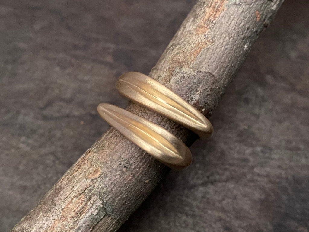 The Clarity ring of the Honey Drip Collection.