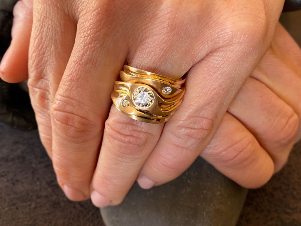A gorgeous 18K gold and diamond bespoke anniversary ring set.