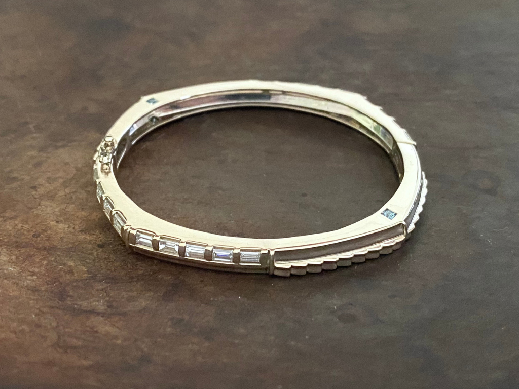 The Silo Diamond Bracelet- This stunning hinged diamond bracelet combines the structural standing seams and shingles of the Silo roofline with the windows of the Silo for an extra sparkly look. Wear as a single bracelet or, together with the Standing Seam Bracelet for a striking set.