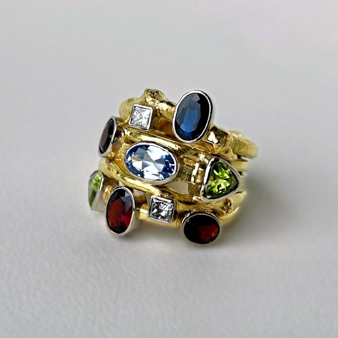 A gorgeous bespoke ring showcasing a variety of stones.