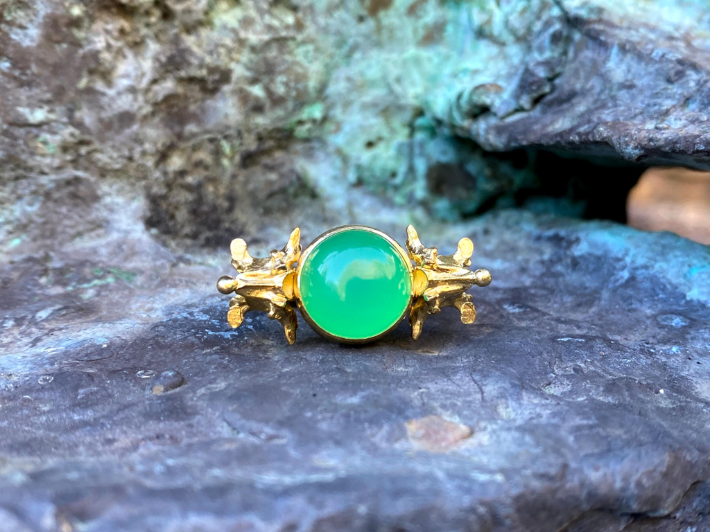 The Perception ring, a one-of-a-kind 22K and 18K yellow gold ring with its gemmy Chrysoprase cabochon.